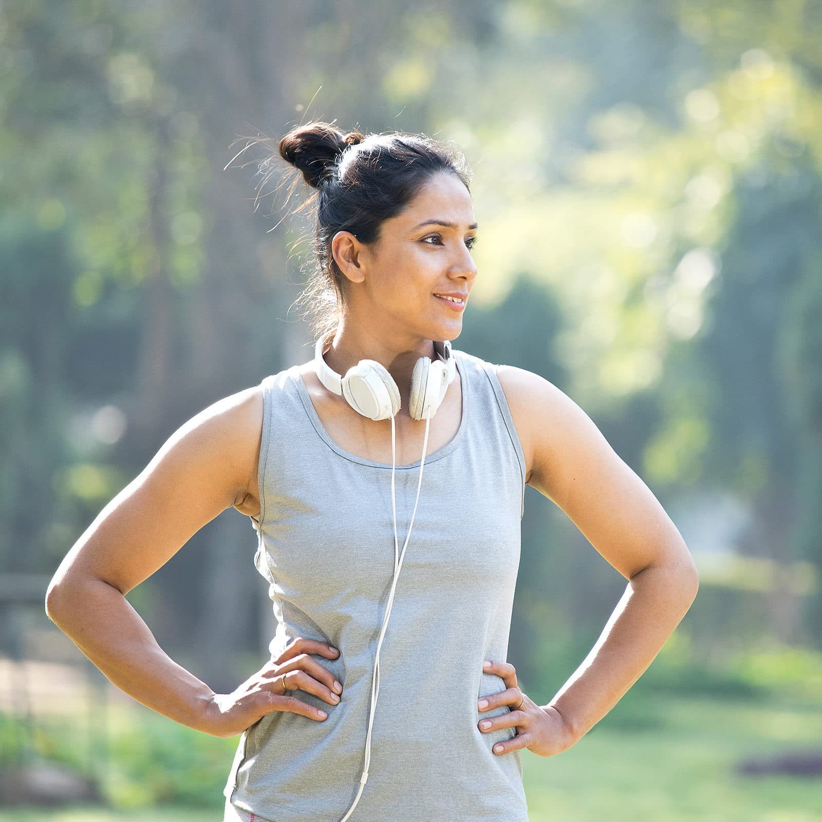 Woman taking a break from working out in the park